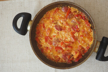 top view of turkish menemen on a wooden table 