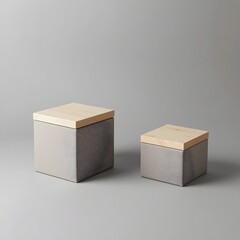 Two minimalist storage boxes made of concrete with wooden lids on a neutral gray background, showcasing modern home organization, Scandinavian design, and stylish interior decor aesthetics.