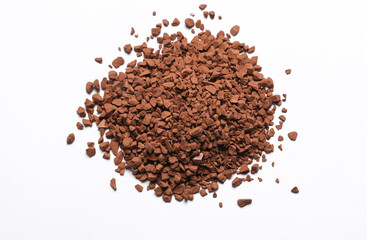 Pile of instant granulated coffee on a white background