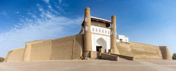 Panoramic view to the Ark of Bukhara fortress with main entrance and empty square in Bukhara,...