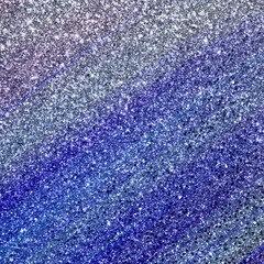 Closeup of fresh green grass texture and leaf pattern against a natural water background