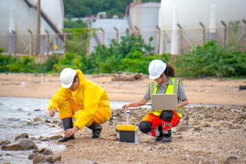 Scientists and assistants are collecting water samples from natural sources to analyze contaminants from water discharged from industrial plants.