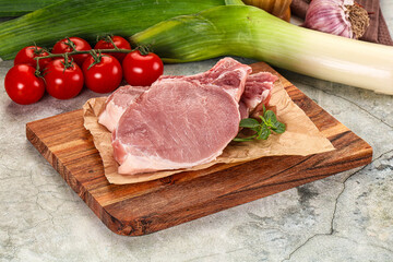 Raw pork steak loin with bone