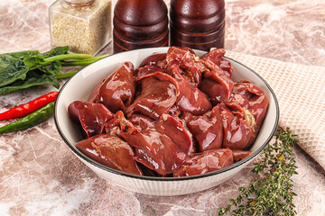Raw uncokked chicken liver in the bowl