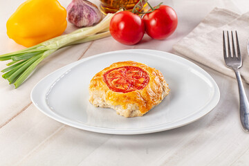 Chicken chop cutlet with cheese and tomato