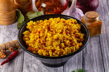 Indian yellow curry rice with tumeric