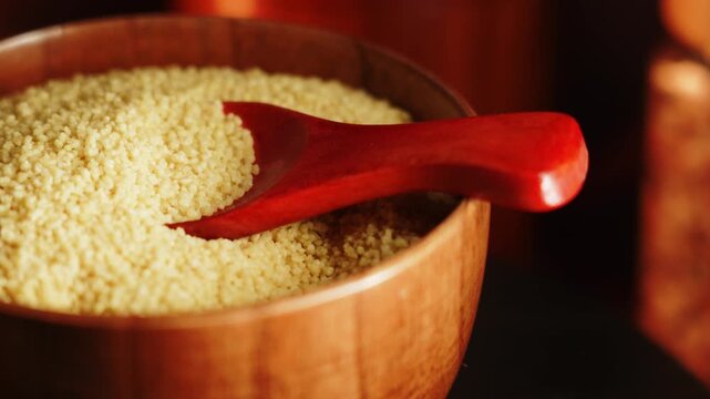 Understanding uncooked couscous preparation and characteristics in a kitchen setting