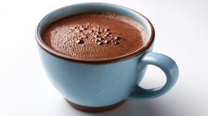 Close up of a blue coffee cup with rich foam