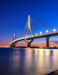 Obraz premium Modern bridge over water at dusk