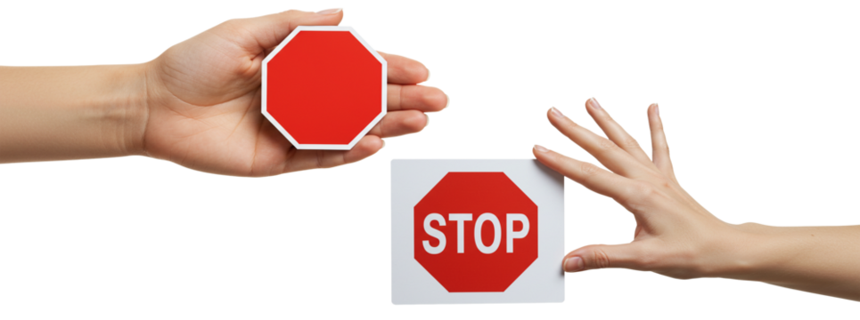 Hands presenting stop signs, conveying a clear message to halt or pause for important decisions.