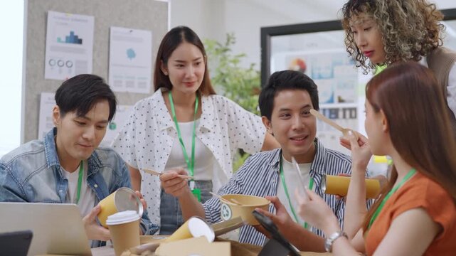 Creative business  product developers actively brainstorm ideas, sharing discussions ESG  green energy focusing on product repackaging and reuse strategies to reduce costs maximize profit business