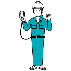 安全帯を装着する作業員の女性（全身）