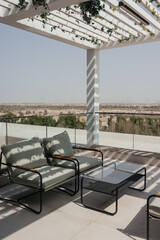 Fototapeta premium balcony exterior with desert view and outdoor furniture in Emirates residence