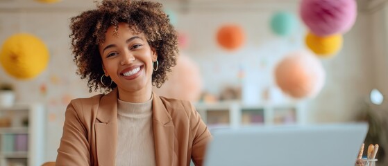 The woman working on a laptop in a bright modern home office