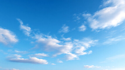 Blue sunny sky with rolling, fast motion white clouds in horizon, nice panoramic view. white fluffy cloudscape with blue skies.