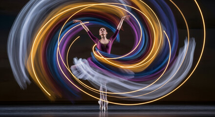 Graceful Ballet Performance with Swirling Light Effects,Ballerina in En Pointe with Dynamic Light Painting Background