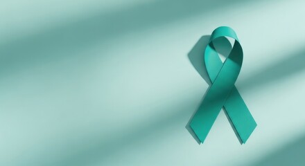 Teal ribbon supporting awareness of ovarian and cervical cancer campaigns, with soft light, on a modern background
