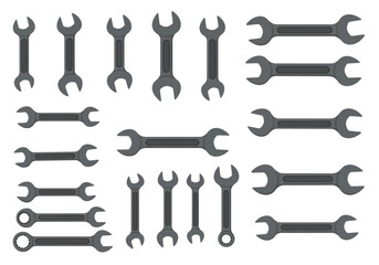 Collection of various metal wrenches tools for mechanical work.