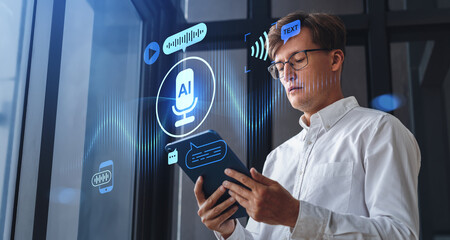 Man using tablet with AI voice assistant interface concept, digi