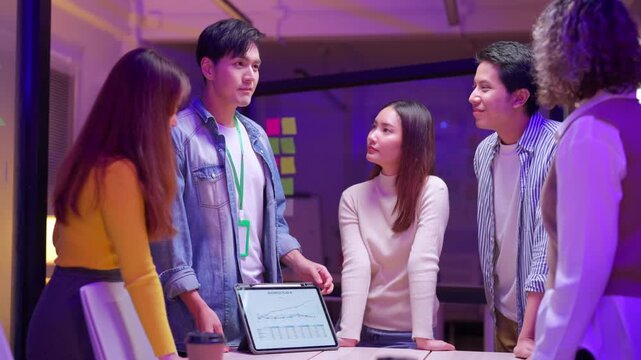 Asian business professionals creative product developers brainstorm innovative ideas prepare present new business plan leverage AI assistance big data analytics enhance strategic growth optimize work