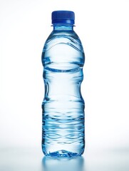 Naklejka premium Transparent blue water bottle on white backdrop isolated, plastic beverage container for drinking hydration healthy lifestyle eco friendly recycling packaging and product design mockup template