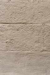 Beige stone wall texture background