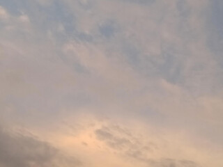 light soft sunset sky background with clouds