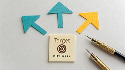 Arrows pointing toward target with aim well written