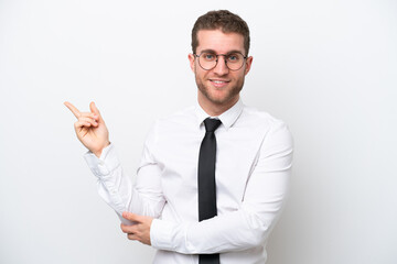 Young business caucasian man isolated on white background pointing finger to the side