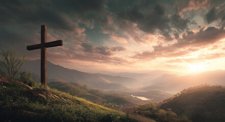 Wooden Christian cross on mountaintop at sunrise