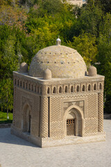 General view of the Samanid Mausoleum in Bukhara, Uzbekistan. Building's shape is cuboid with baked brick decoration is combines multi-cultural ancient eastern motifs. Built in the 10th century CE.