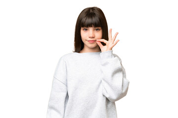 Little girl over isolated green chroma key background showing a sign of silence gesture