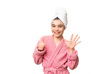 Little girl in a bathrobe over isolated chroma key background counting six with fingers