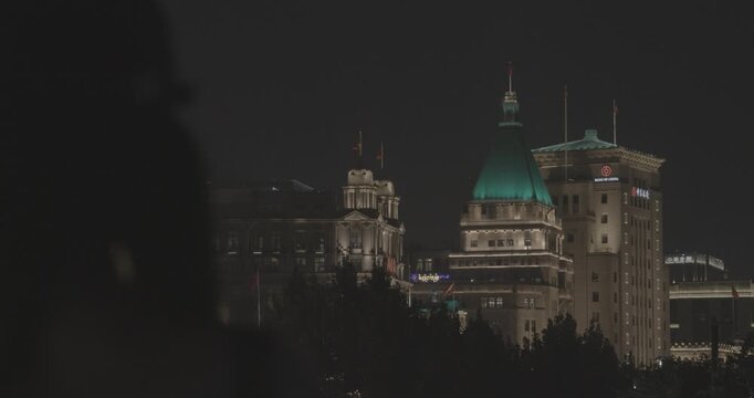 Colorful Rooftops of Shanghai's Historic Buildings Under a Starry Sky