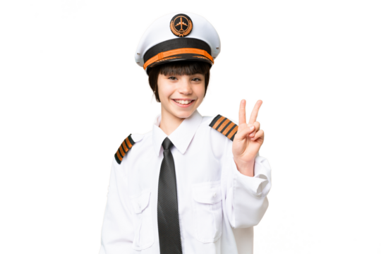 Little girl as a Airplane pilot over isolated chroma key background smiling and showing victory sign