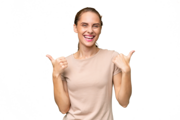 Young caucasian woman over isolated background with thumbs up gesture and smiling