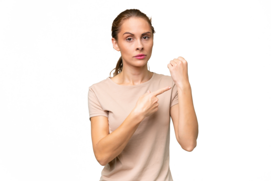 Young caucasian woman over isolated background making the gesture of being late
