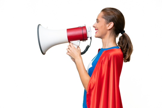Super Hero caucasian woman over isolated background shouting through a megaphone