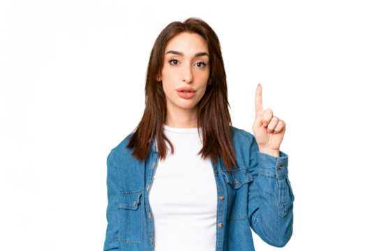 Young caucasian woman over isolated chroma key background intending to realizes the solution while lifting a finger up