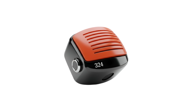 Red-grilled black cube microphone with dial on black background
