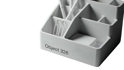 White desk organizer with pens and clips against black background