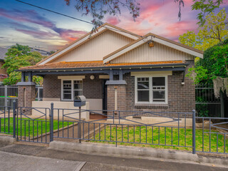 Beautiful colours of a Spring Sunset over Residential houses in inner Sydney suburb of Ashbury NSW Australia Double Brick federation house western sydney 