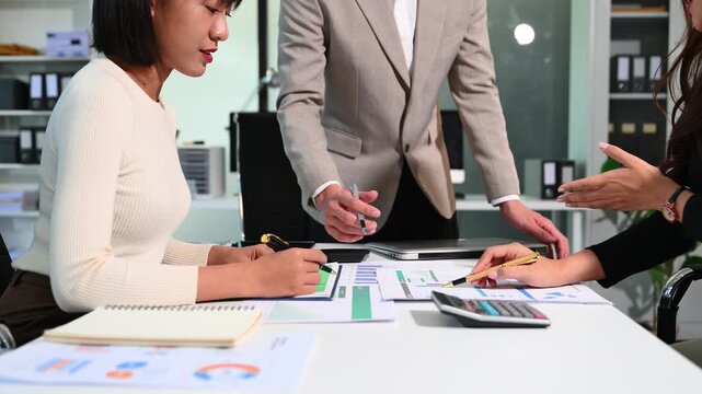 Business team meeting present.professional investor working with Finance managers task. with laptop smart phone