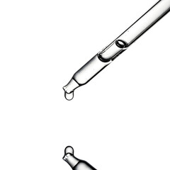 Transparent pipette dropping liquid against transparent background