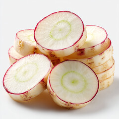 A close up view of a pile of sliced white radishes with red edges on a white background surface