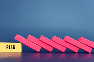stopping the domino effect. executive and risk control concept