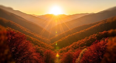 Golden sunrise over mountain range with autumn trees and sunlight landscape scenic nature views