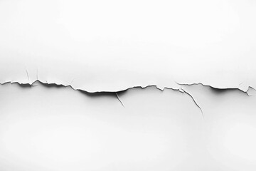 Close-up of a jagged horizontal crack in a white surface, revealing texture and depth with subtle...