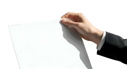 Hand holds up blank white paper; arm in suit sleeve