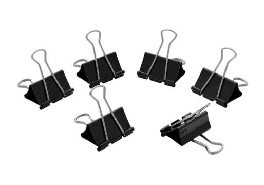 Collection of black binder clips on a dark background